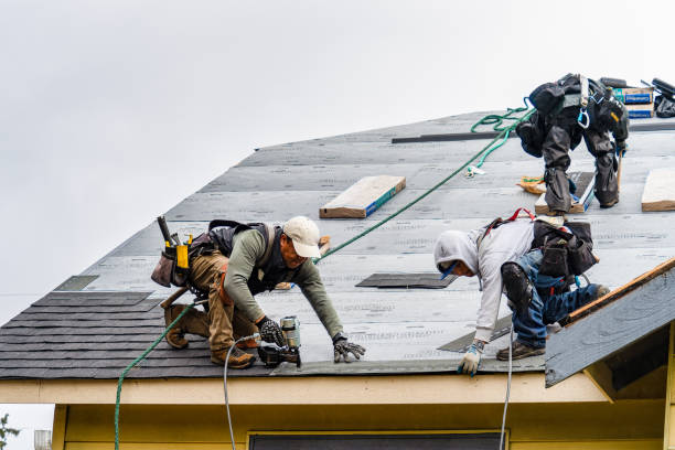 Professional Roofing technician working in Redlands, CA